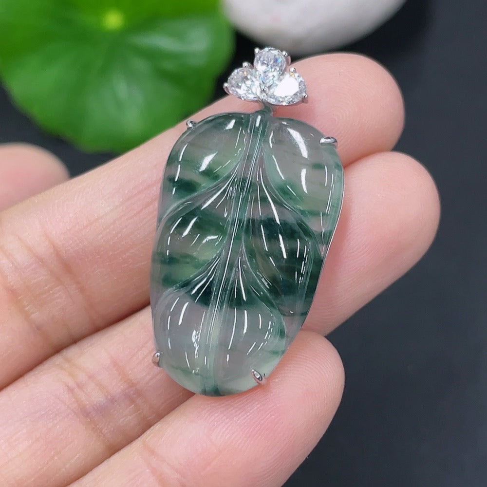 Jadeite leaf pendant by HUILIU HQ featuring 18k non-diamond inlay, showcasing detailed jade leaf design and craftsmanship.