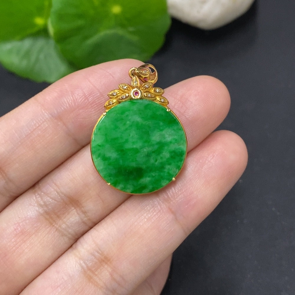 Jadeite plain pendant with 18K gold mount, diamond accents, and mineral components, displayed as a jewelry necklace.