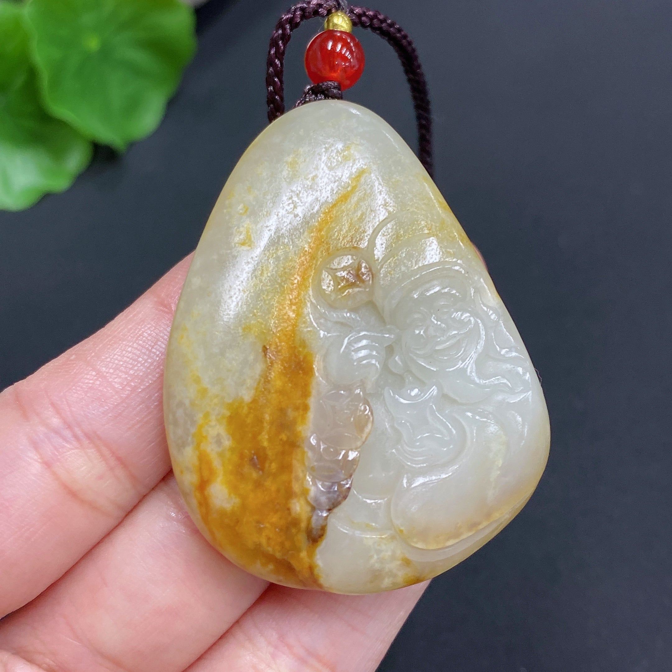Hetian Jade Pendant God of Wealth Total Weight (including rope): 35.1g Undetermined skin color cause