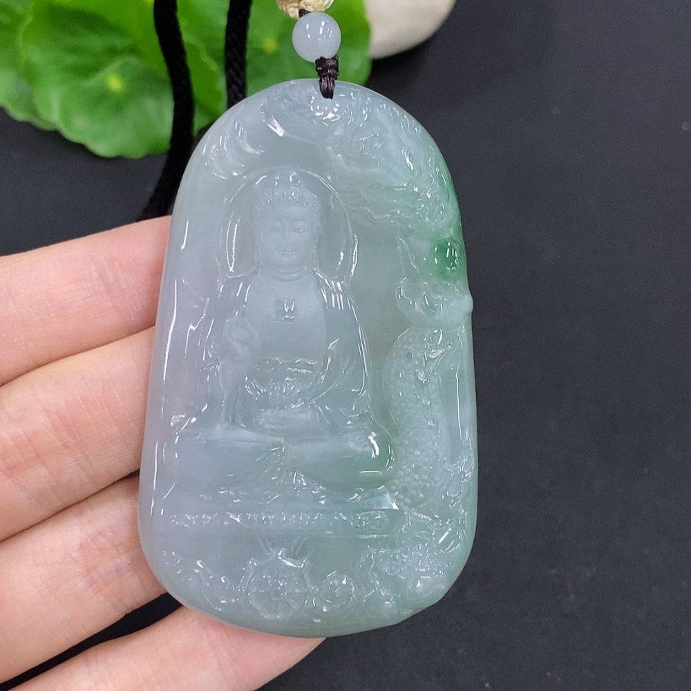 Jadeite Amitabha pendant in green jade, featuring intricate carvings, from HUILIU HQ, displayed on a neutral background.