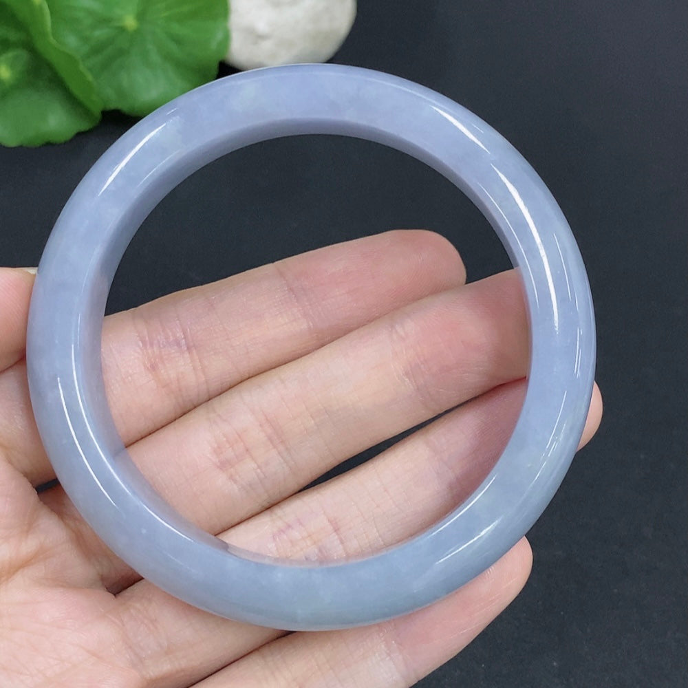 HKHQ jadeite round bracelet with 55.2g weight and size 57, featuring smooth, polished jadeite beads in natural green hues.