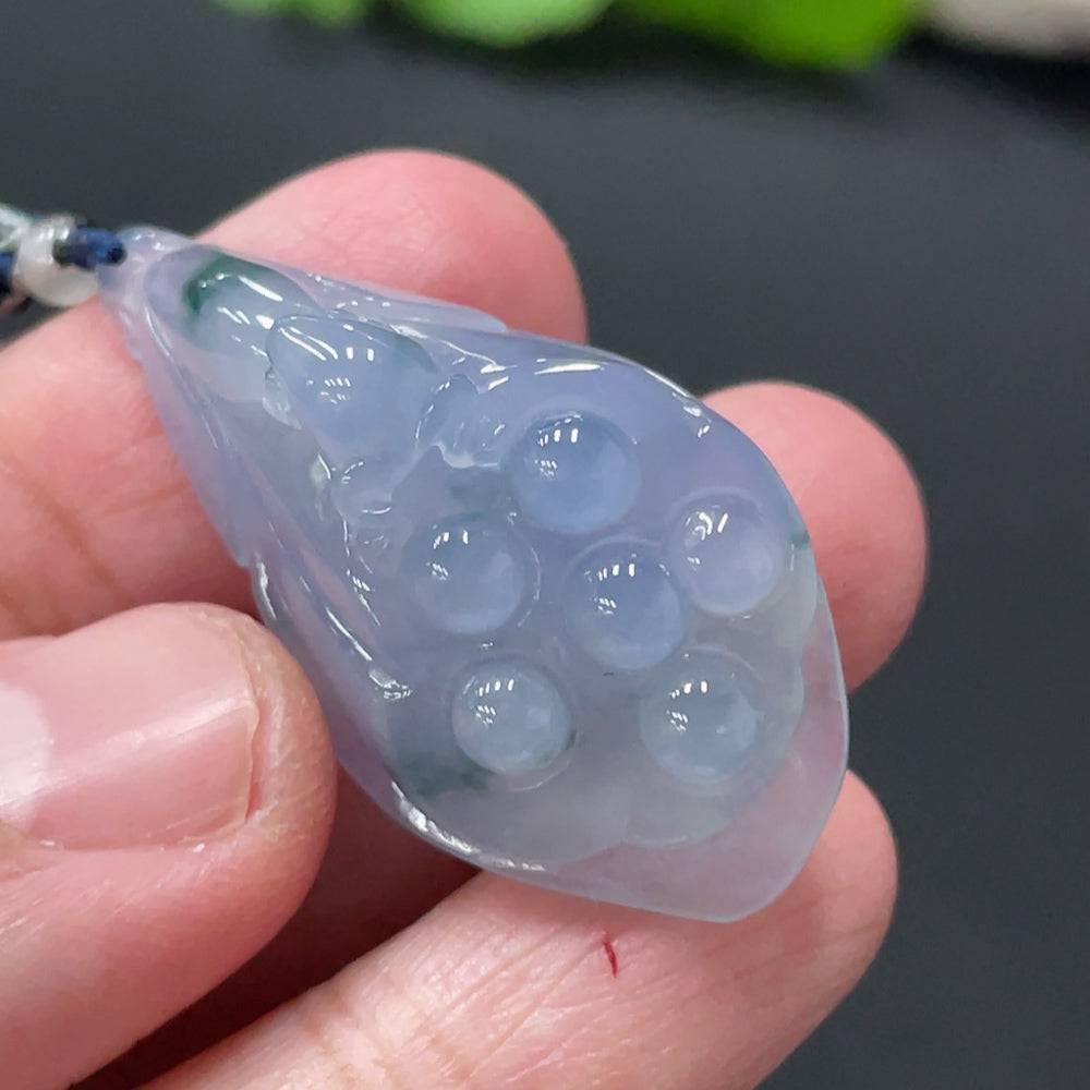 Jadeite Lotus Pod Pendant from HUILIU HQ, featuring a detailed green jade lotus design, weighing approximately 9.33 grams.