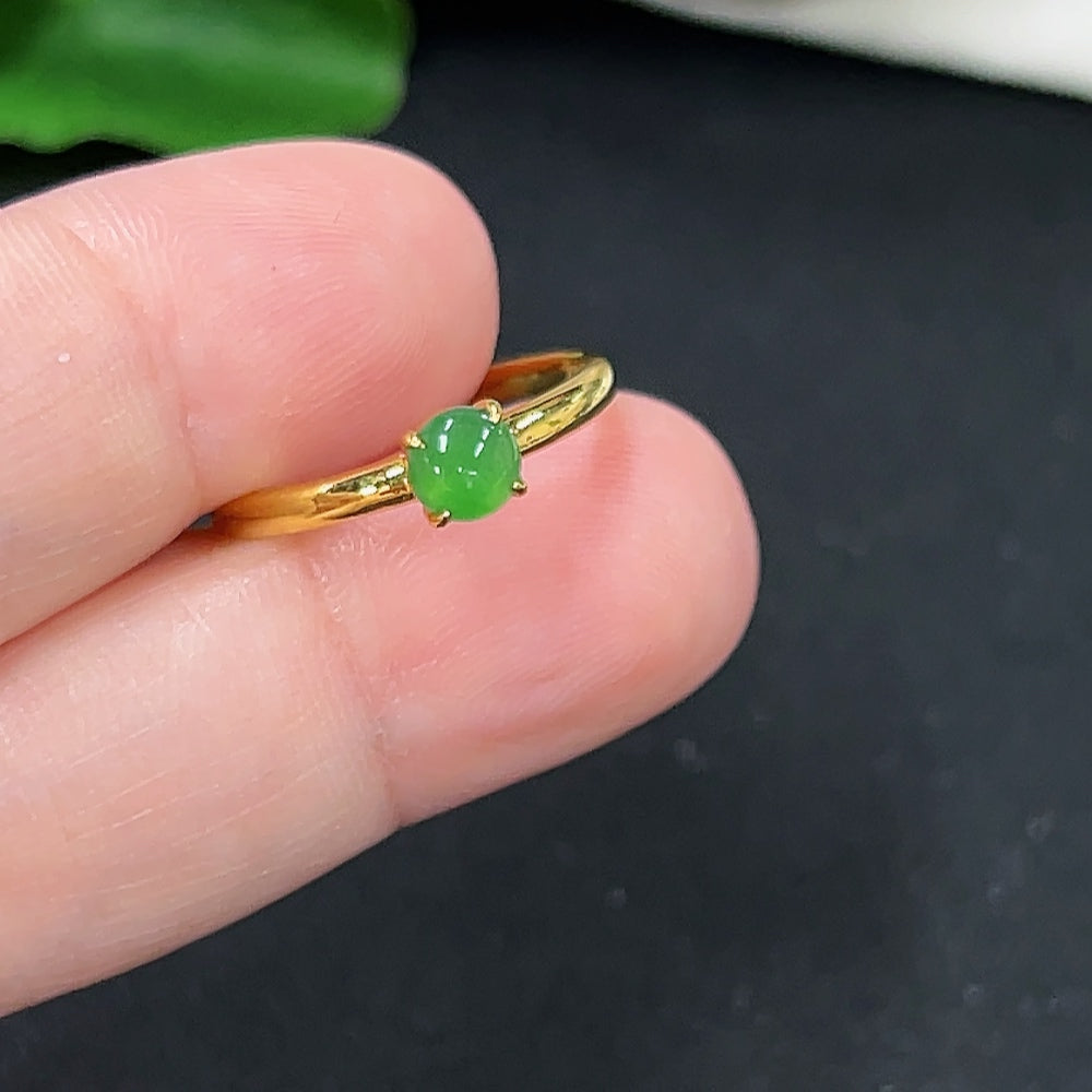 HKHQ jadeite inlaid ring with 18K gold band, showcasing intricate jadeite stone detailing in a fine jewelry design.