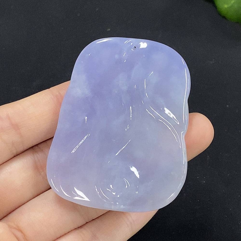 Huiliu Certified Jadeite Guanyin pendant featuring detailed carving, showcasing smooth, green jade craftsmanship.