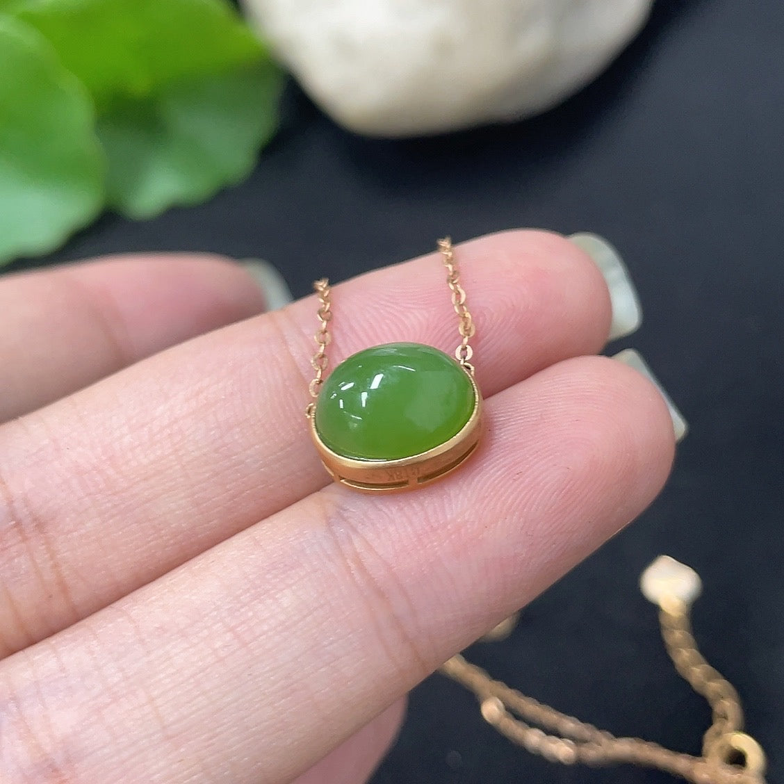 Hetian jade inlaid pendant on 18k gold chain, HKHQ necklace with elegant jade and gold design, 2.5g total weight.