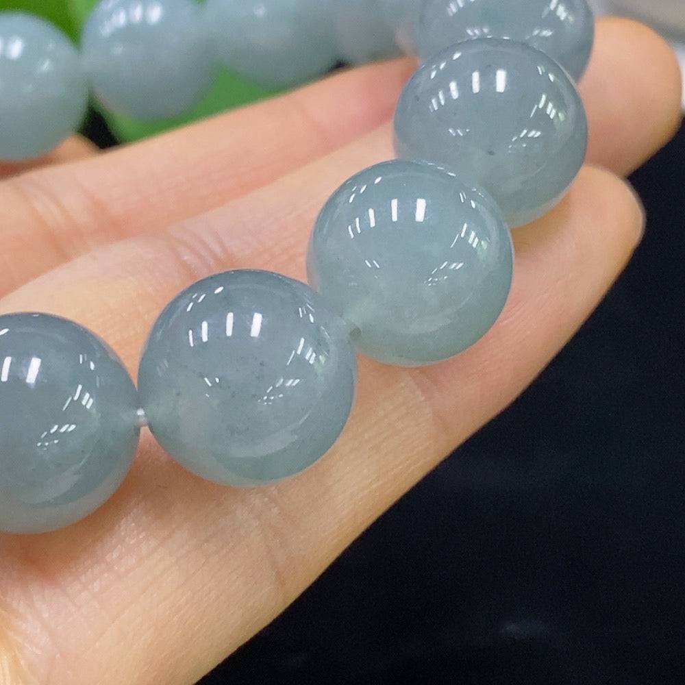 HUILIU HQ jadeite bracelet with 13mm beads, weighing approximately 58.13 grams, featuring smooth green jade stones.
