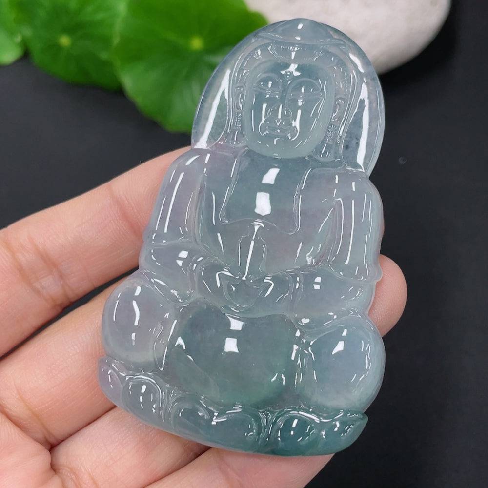 Jadeite Guanyin pendant from HUILIU HQ, detailed carved figure, weighs approximately 27.26g, showcasing smooth jade craftsmanship.