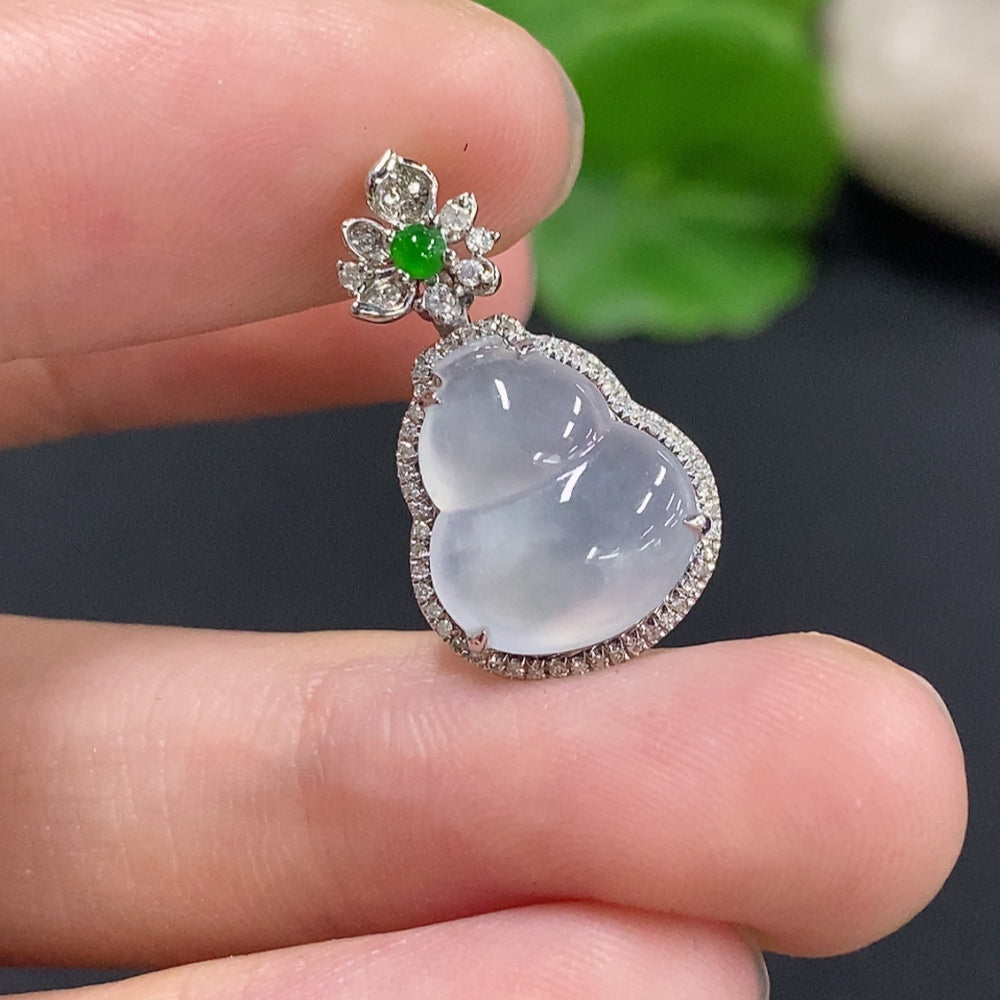 Jadeite pendant in gourd shape with 18k gold and diamond accents, weighing approximately 1.9g, from HKHQ.