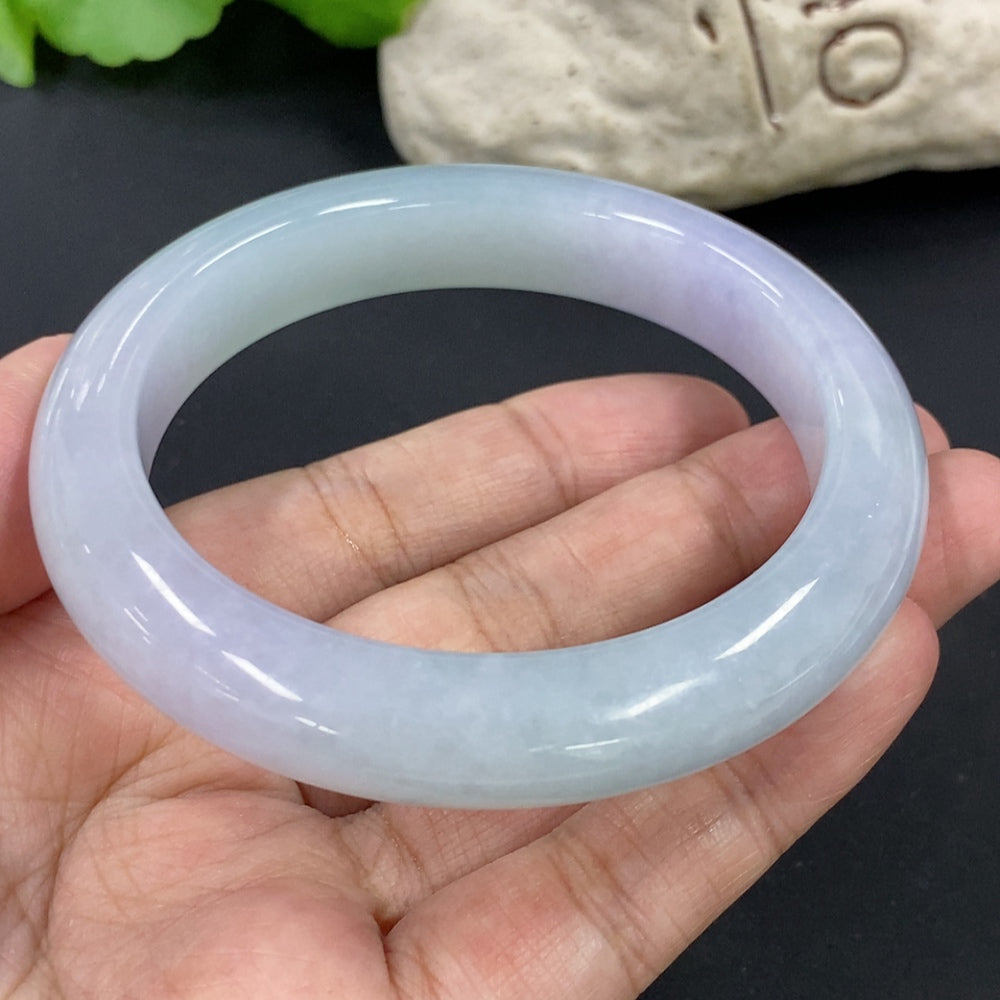 HKHQ jadeite round bangle, 67.3g, size 58.7mm, showcasing smooth, polished jadeite with a glossy finish.