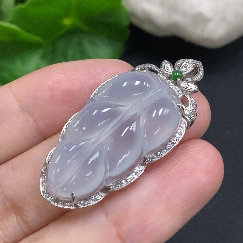Huiliu Jadeite leaf inlay pendant with diamond accents, featuring a detailed jade jadeite design and elegant craftsmanship.