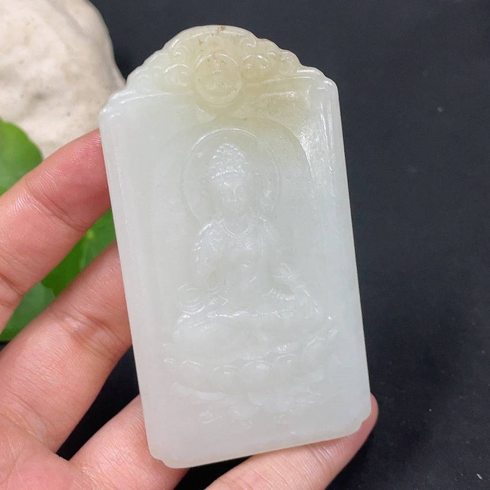 Huiliu certified Hetian jade Guanyin pendant featuring intricate carving, smooth polished surface, and traditional design.