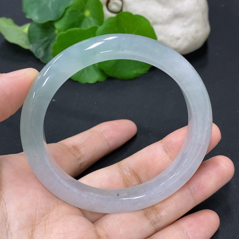 Jadeite round bangle from HKHQ, size 56.7, featuring a smooth jade surface with a total weight of approximately 44 grams.