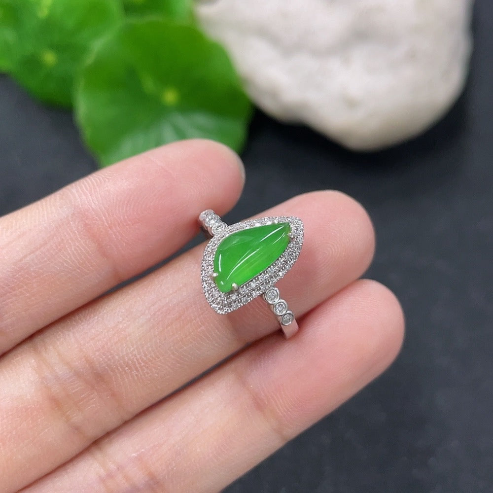 Jadeite ring with 18K gold band and diamond accents, size 13, weight 2.34g, showcasing elegant jewelry design.