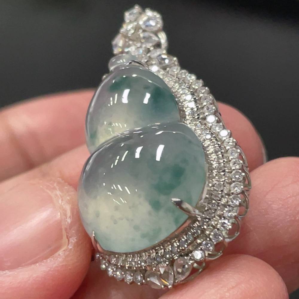 Jadeite gourd pendant by HUILIU HQ with 18K gold setting and small diamond accents, weighing approximately 6.5 grams.