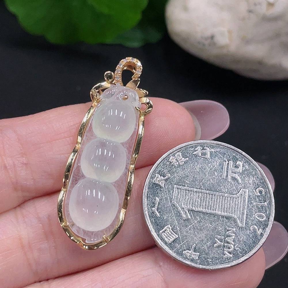 Huiliu Jadeite Fu Dou pendant with diamond accents, featuring smooth green jade and intricate carved design.