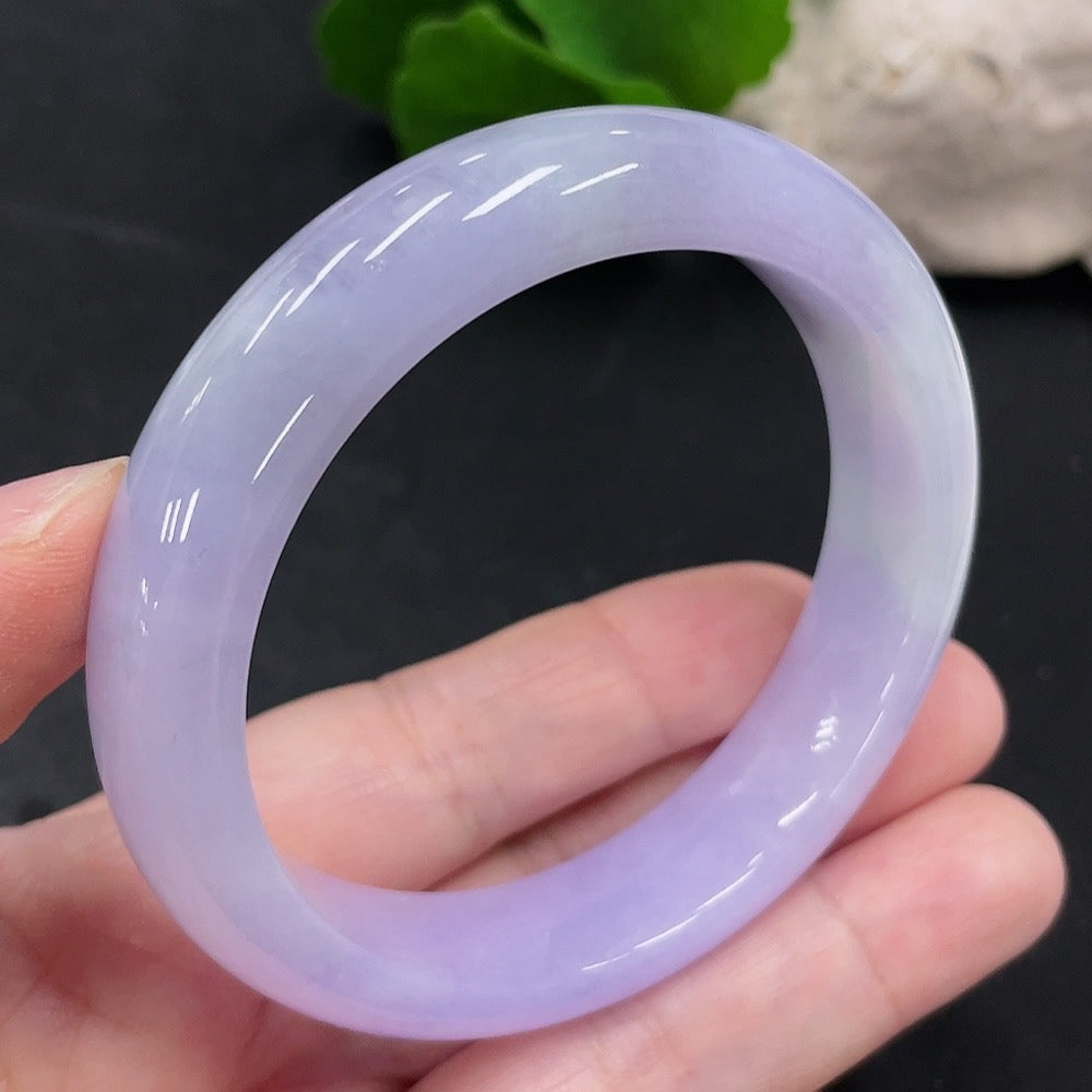 HUILIU HQ jadeite round bangle in size 54.3 with approximately 56.8g weight, showcasing smooth, polished jade surface.