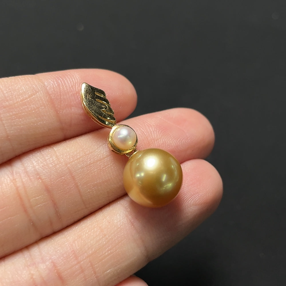 White seawater pearl pendant necklace featuring 18K gold color setting, approximately 10.5mm pearl, by HKHQ.