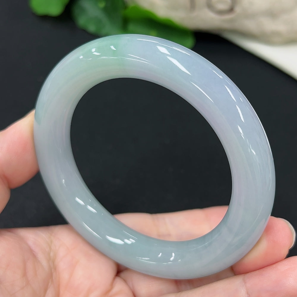 HKHQ jadeite round bangle, size 55.2, weighing 73.56g, featuring smooth, polished jadeite surface and classic bracelet design.