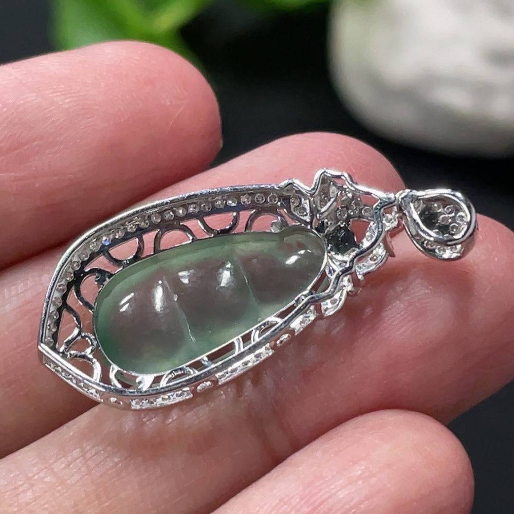Jadeite blessing bean pendant with 18K gold setting and diamond accents, crafted by HUILIU HQ, weighing approximately 2.79g.