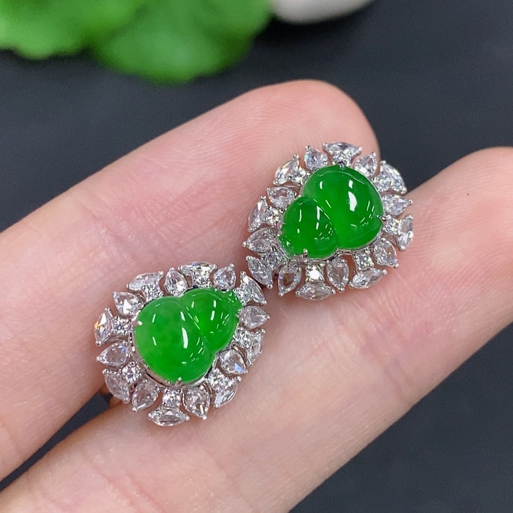 Jadeite gourd earrings by HKHQ featuring 18K gold and diamond accents, displayed on a white background.