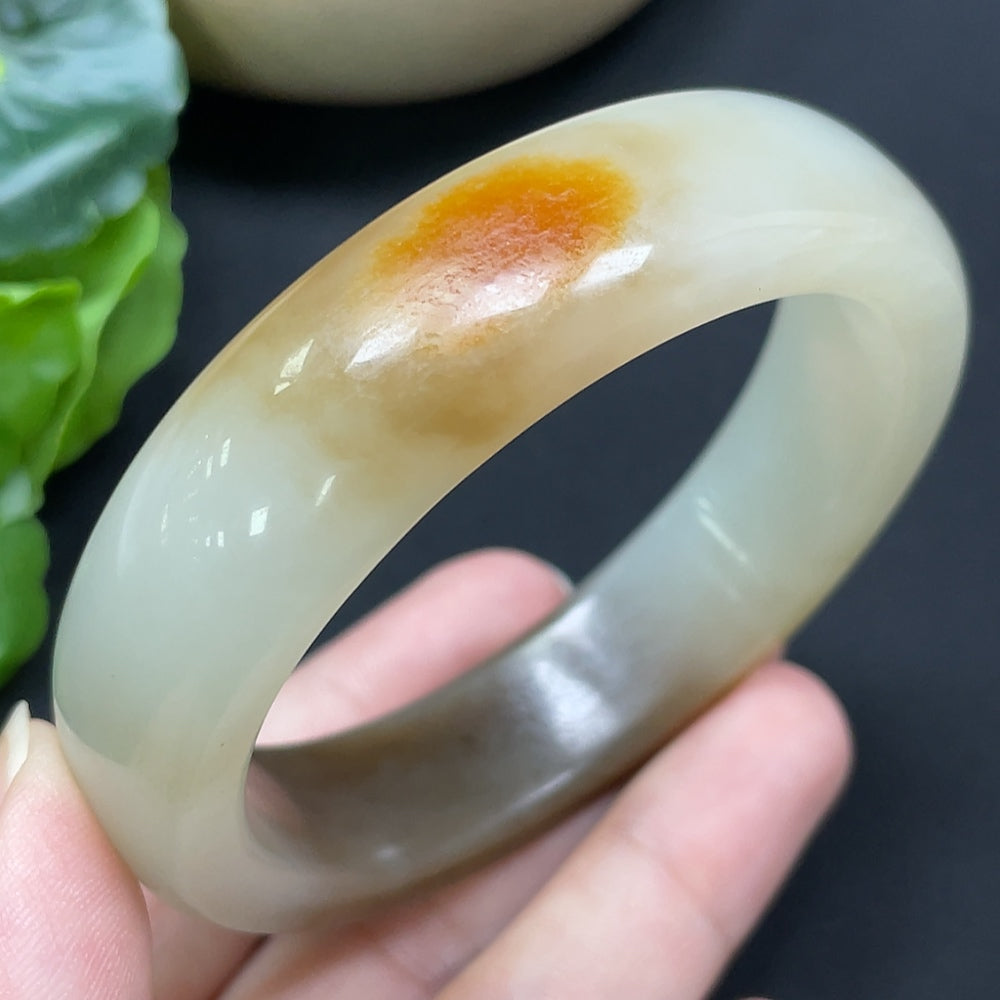 HKHQ Hetian Jade round bracelet with mineral components, 55.8mm diameter, approximately 66.44g weight, showcasing smooth jade beads.