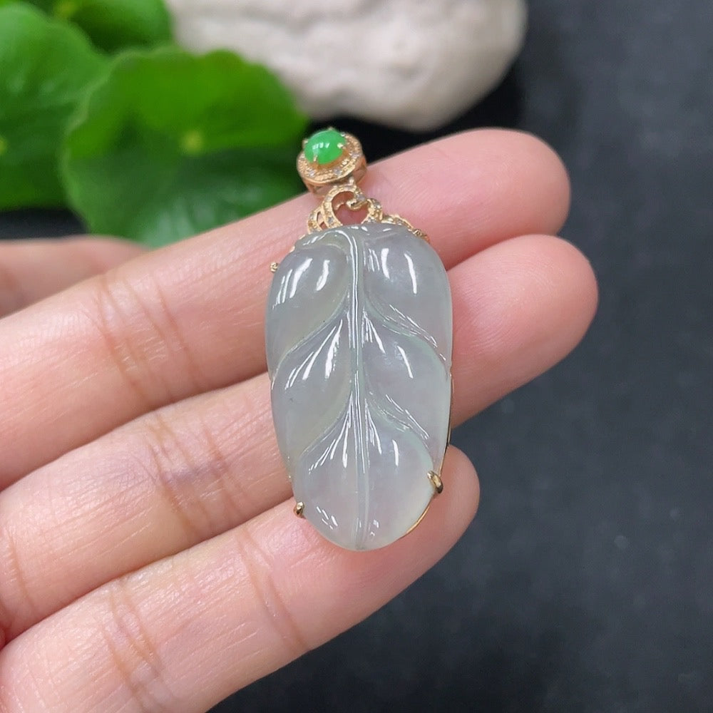 Huiliu Jadeite leaf pendant with diamond accents, crafted from green jade jewelry, featuring intricate leaf design and sparkling diamond details