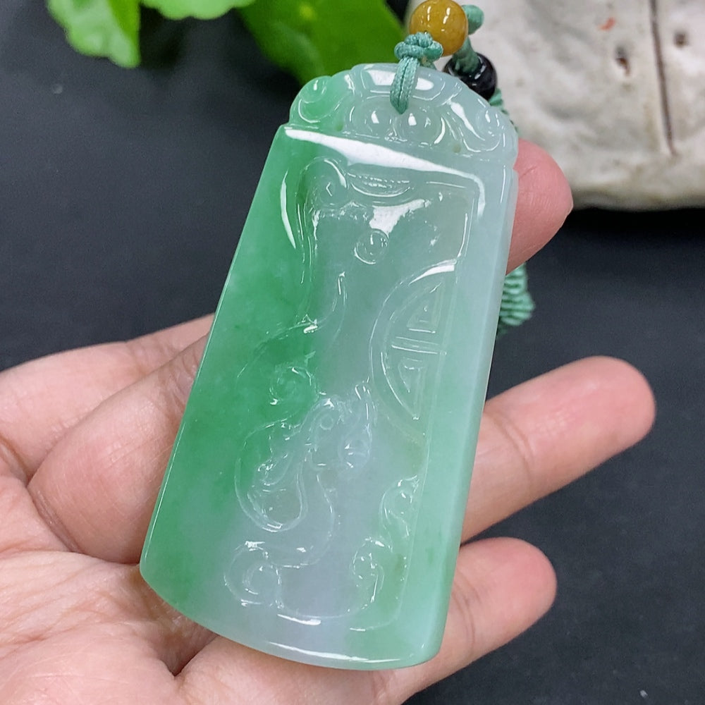 Antique jadeite pendant necklace by HKHQ, featuring a polished jadeite pendant, weighs approximately 32g, displayed against a neutral background.