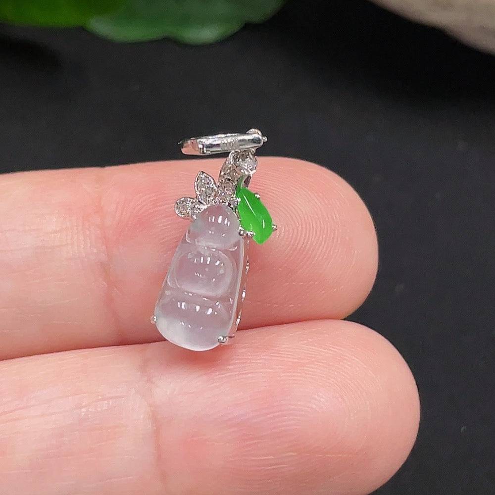 Jadeite lucky bean pendant by HUILIU HQ with 18K gold and diamond accents, featuring a smooth green jade surface and detailed design.