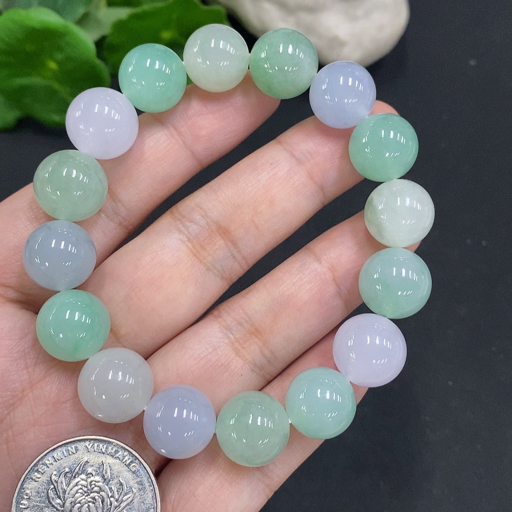 HUILIU HQ jadeite bead necklace with 12mm beads, approximately 54.5g, showcasing smooth, polished green jade stones.