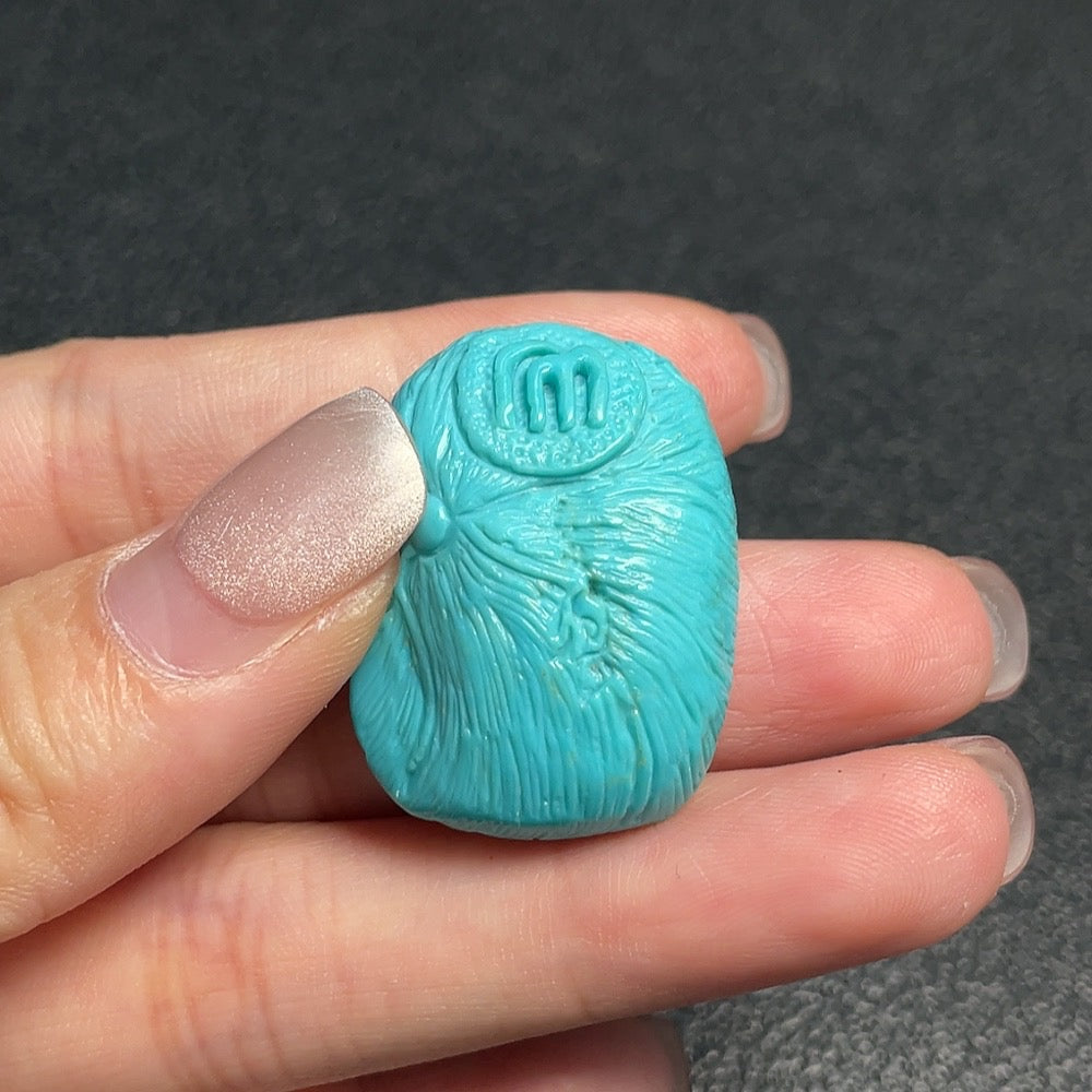 Turquoise gemstone pendant weighing approximately 10.2g, featuring a vibrant blue stone, from the HUILIU HQ collection.