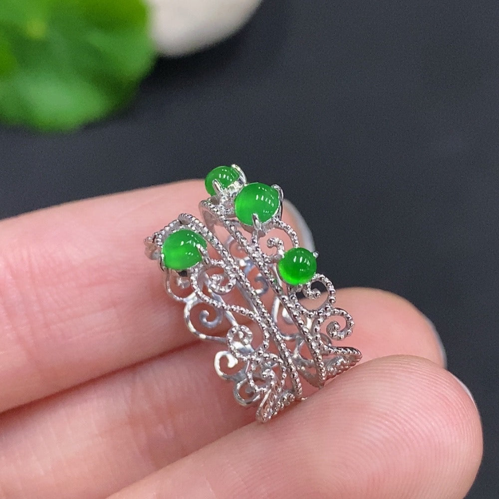 Jadeite cabochon solitaire ring by HUILIU HQ with 18K gold band, size 9, featuring a polished green jade stone.