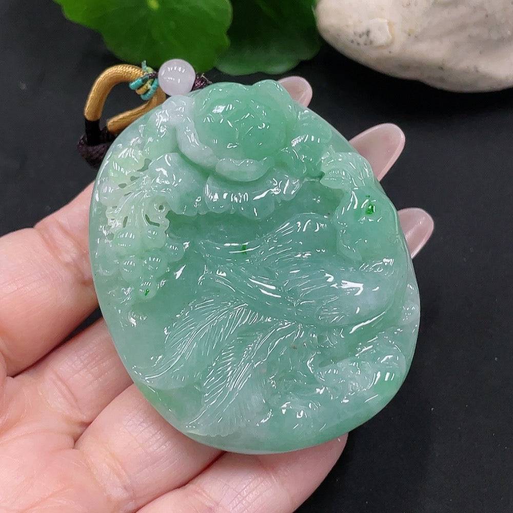 Huiliu Jadeite Phoenix and Peony pendant featuring detailed carved jade in vibrant green with gold accents.