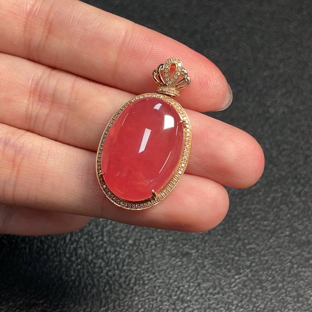 Huiliu Rhodochrosite pendant with diamond accents, showcasing vibrant pink gemstone and sparkling diamond details.