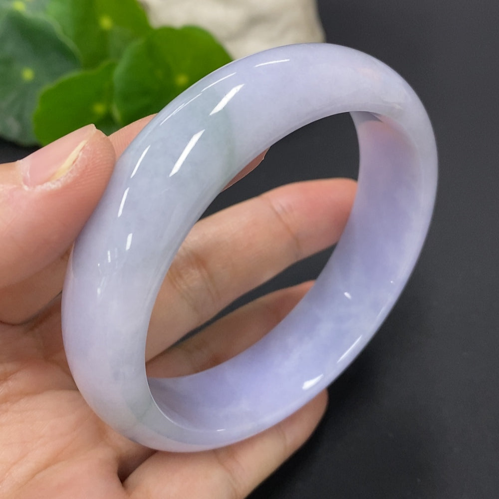 Jadeite round bangle in size 60.2 with a total weight of 71.3g, featuring smooth, polished jadeite material and a classic circular shape.