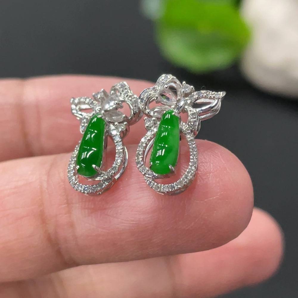 Huiliu Jadeite Lucky Bean earrings pair with diamond accents, featuring small accent stones, set in sterling silver.
