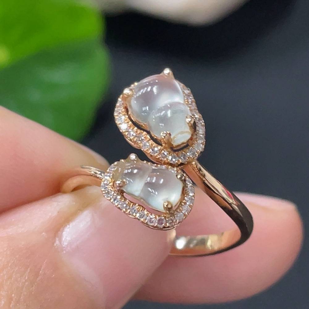 Huiliu HQ jadeite ring with a diamond accent, crafted from green jade, showing the detailed band and polished gemstone.