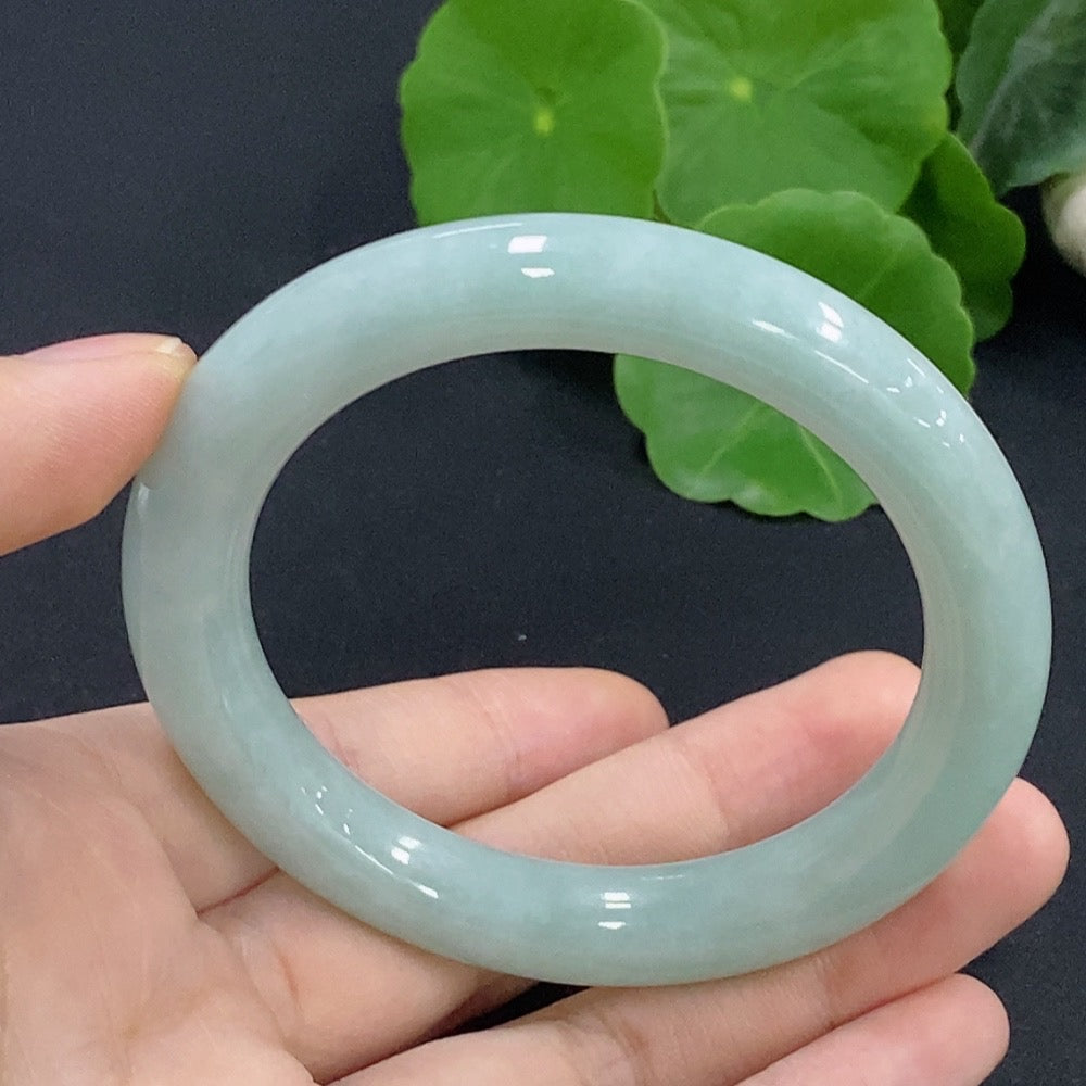 HKHQ jadeite round bangle in size 55.1, weighing 56.12g, showcasing smooth, polished jadeite with a glossy finish.