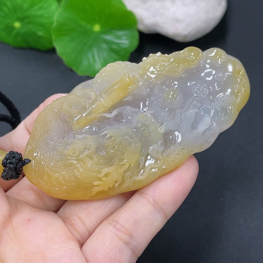 Jadeite dragon pendant with a total weight of approximately 70.5g including the cord (matching beads are non-A)