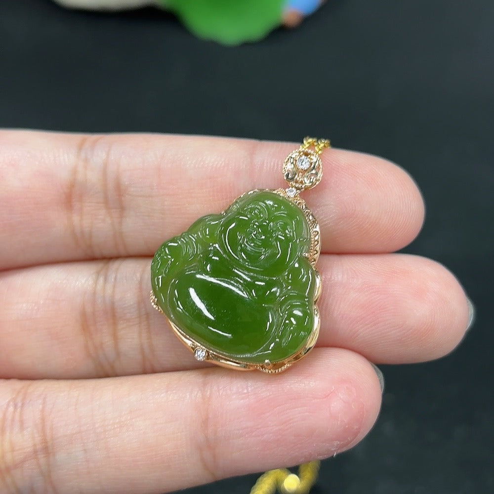 Hetian Jade Buddha pendant necklace with 18K gold setting, featuring a smooth jade carving and elegant design.