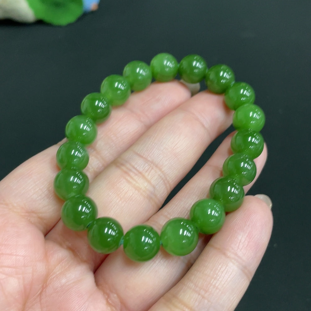 Hetian Jade Jasper bracelet with 9.3mm beads, featuring natural jade stones, weighing approximately 24.1g, from HUILIU HQ.
