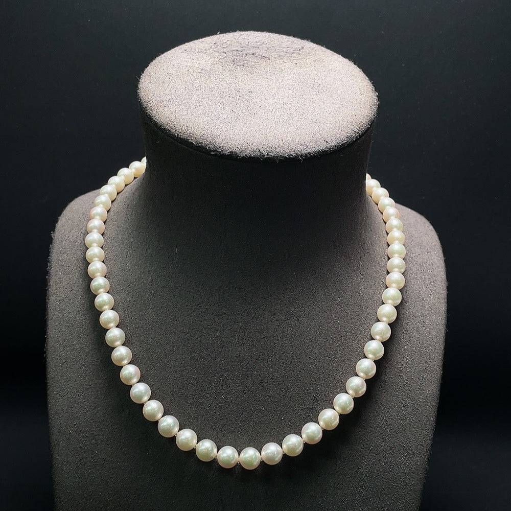 Huiliu seawater pearl necklace with 7.5mm pearls, certified Huiliu HQ, featuring elegant, lustrous pearls on a delicate strand.