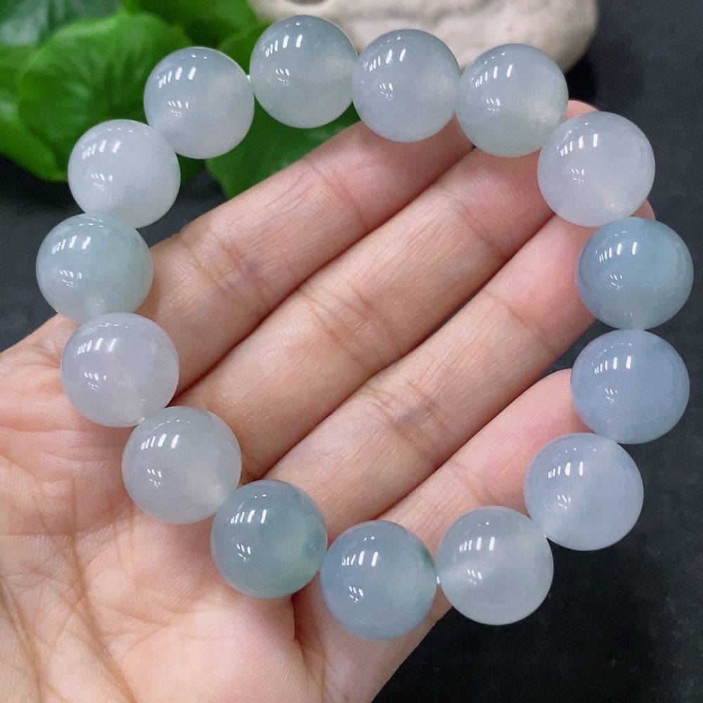 HUILIU HQ jadeite bracelet with 12.5mm beads, weighing approximately 57.1g, featuring smooth, polished jade stones.