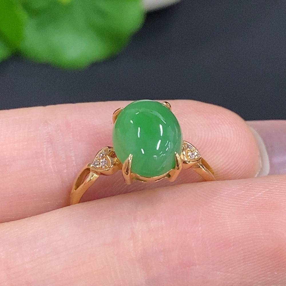Jadeite cabochon ring with diamond accents in 18k gold, size 12, featuring a smooth green jade stone and sparkling diamonds.