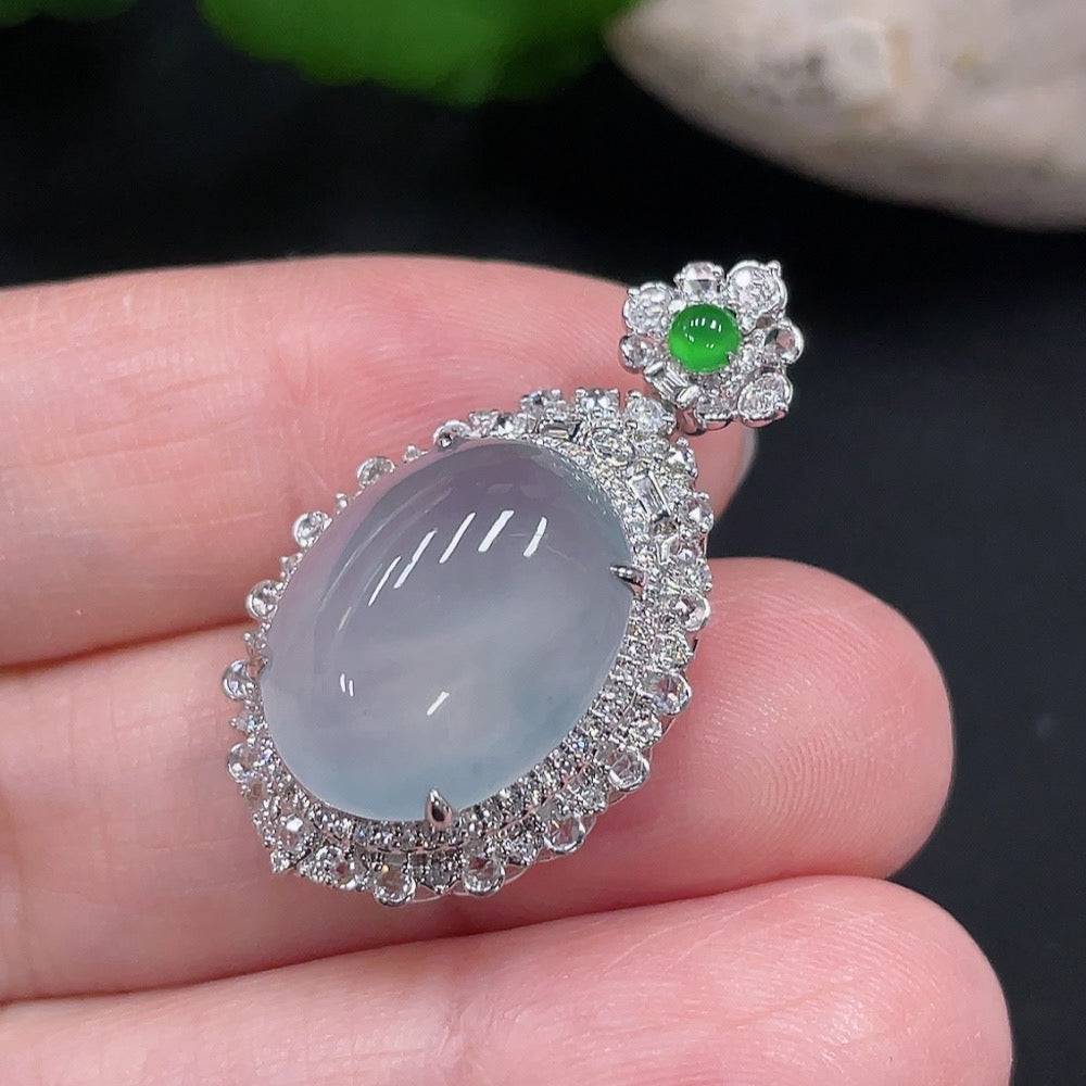 Jadeite pendant with 18K gold mount accented with diamonds, featuring a polished green jade stone, by HUILIU HQ.