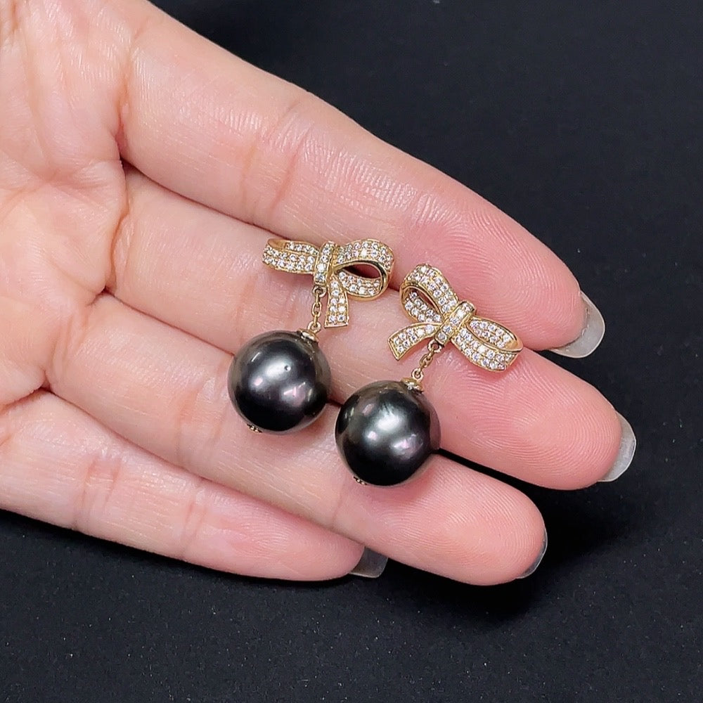 HKHQ seawater pearl earrings set in 14k gold, 12.1mm pearls, featuring elegant gold settings, 7.69g total weight, non-diamond jewelry