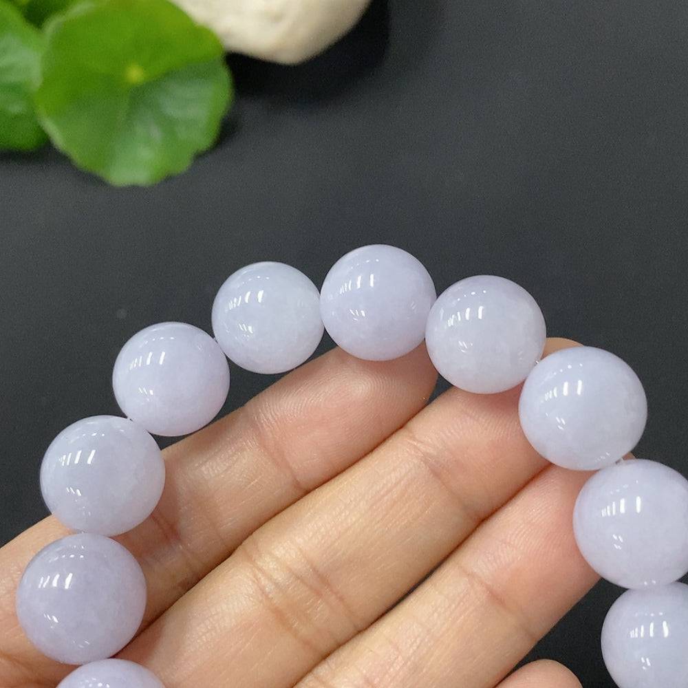 HUILIU HQ jadeite bracelet with 12.8mm beads, approximately 55g, showcasing smooth, polished green jade beads on a white background.