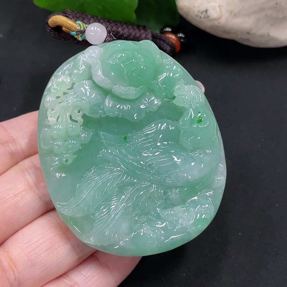 Huiliu Jadeite Phoenix and Peony Pendant featuring intricate carved jade in vibrant green with detailed phoenix and peony design.
