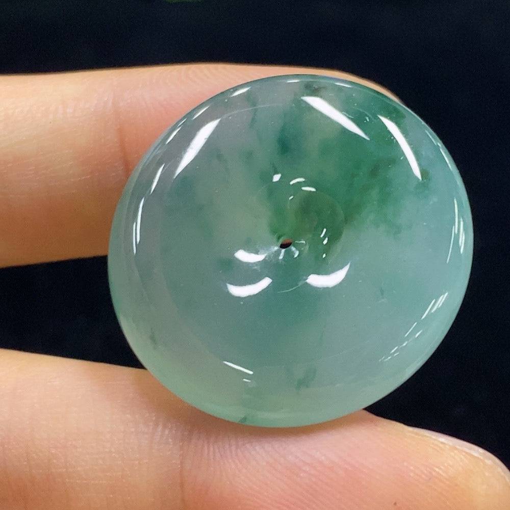 Jadeite safety buckle pendant in jade, weighing approximately 9.9g, with intricate design and smooth polished surface.