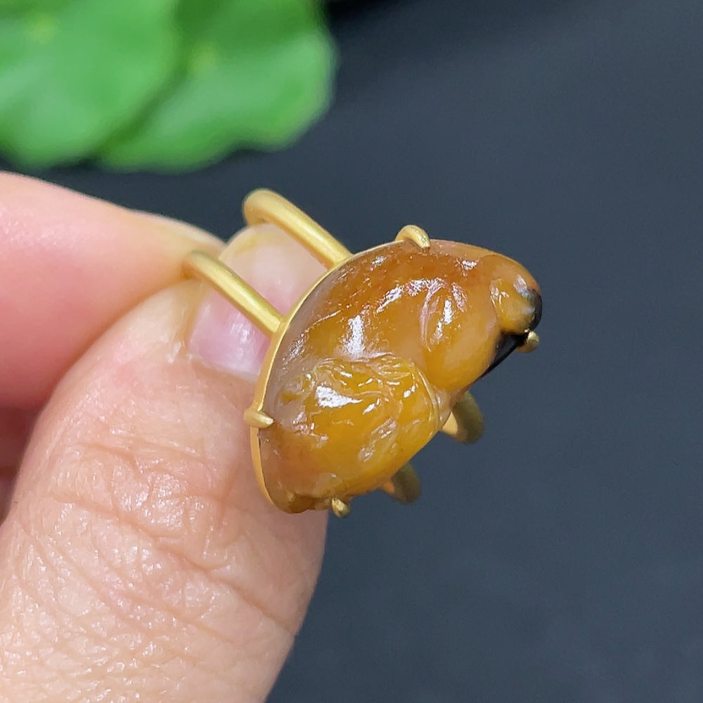 HKHQ Hetian Jade auspicious beast inlaid ring featuring intricate jade carvings and a detailed design, crafted for elegance.