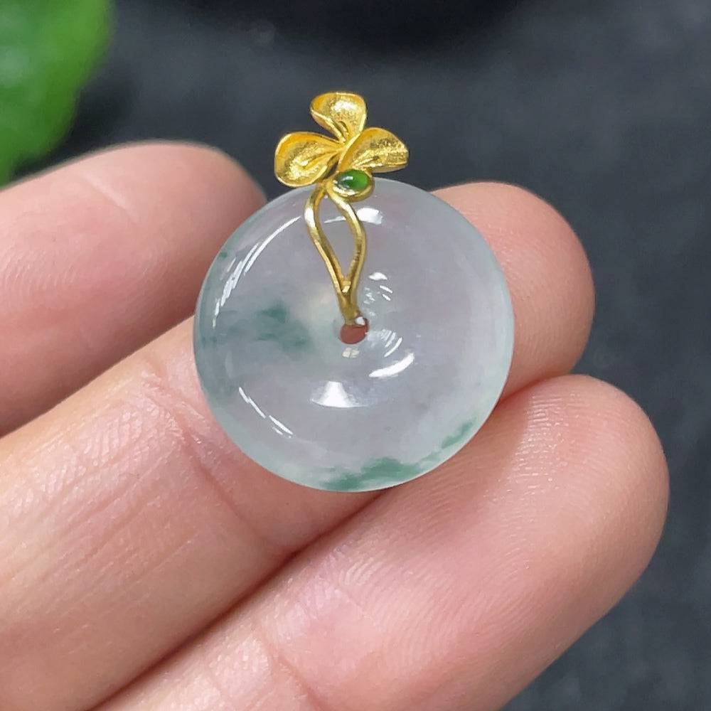 Jadeite Peace Knot pendant with 18k gold clasp, handcrafted jade jewelry piece weighing approximately 2.74g.